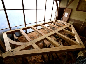 Green oak gable frame in the workshop